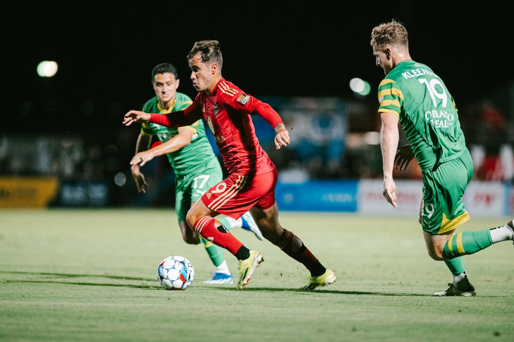 Tomas Angel dribbles against Rowdies